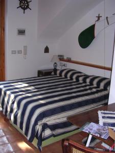 Postel nebo postele na pokoji v ubytování Villa La Zagara