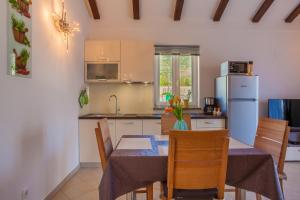 Kuchyň nebo kuchyňský kout v ubytování Apartman Madlen