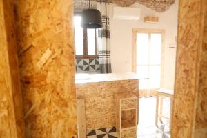 a kitchen that is being remodeled with a counter top at Wehomes - TinyHouse - RhoFiera Milano self check-in in Rho +24 photos