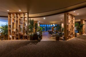 a living room filled with lots of furniture at Kiki Shiretoko Natural Resort in Shari