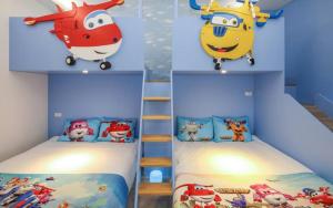 Cama ou camas em um quarto em Wujie Childlike B&B