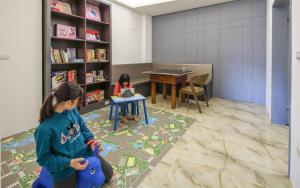 Biblioteca na hospedagem domiciliar