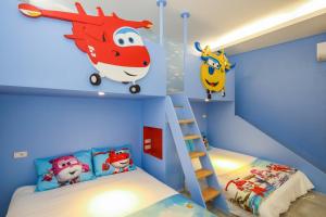 Cama ou camas em um quarto em Wujie Childlike B&B