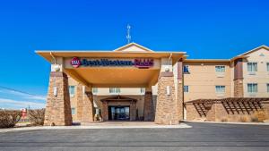 a best western dallas hotel with a sign on it at Best Western Plus Seminole Hotel & Suites in Seminole