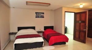 Posteľ alebo postele v izbe v ubytovaní G y V Hotels