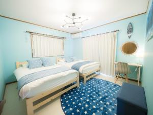 En eller flere senger på et rom på #割引セール #長期滞在歓迎 -- Sumuide Blue --