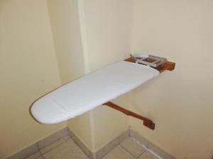 a white mattress sitting on a stand in a room at Hotel Citlalli Xalapa in Xalapa