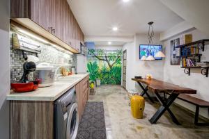 Kuchyň nebo kuchyňský kout v ubytování Mira Moon - Calmette