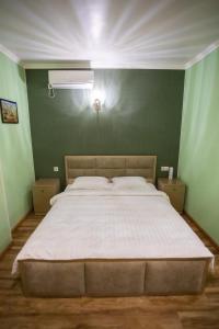 Voodi või voodid majutusasutuse Nork Boutique Hotel toas