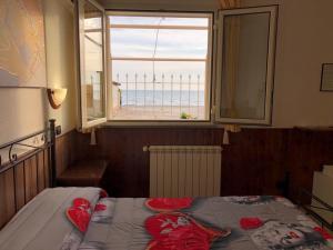 Postel nebo postele na pokoji v ubytování Camere Sul Mare