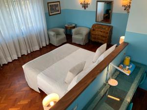 Ліжко або ліжка в номері Hotel David