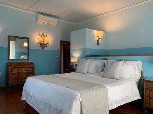 Ліжко або ліжка в номері Hotel David