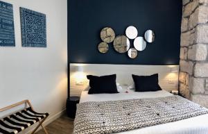 Кровать или кровати в номере Boutique Hotel & Spa la Villa Cap Ferrat