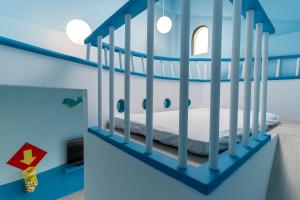 Ein Bett oder Betten in einem Zimmer der Unterkunft 墾丁宜庭海景親子民宿