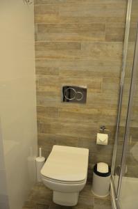 Koupelna v ubytování StanGret Hotel