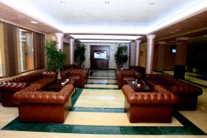 A seating area at Olymp Hotel