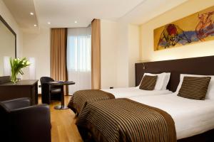 Posteľ alebo postele v izbe v ubytovaní Hotel Diamante + 37 fotografií