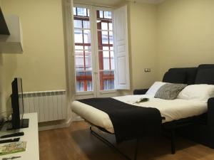 Lova arba lovos apgyvendinimo įstaigoje INSIDEHOME Valladolid Centro -Hab con baño privado en el centro y OPCION DE PARKING-