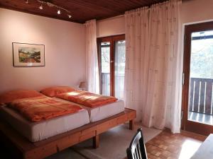 מיטה או מיטות בחדר ב-Villa Leone