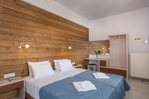 Tempat tidur dalam kamar di Esplanade Apartments