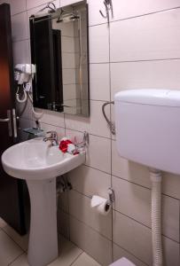 Ένα μπάνιο στο Guesthouse Villa Modex