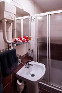 Ένα μπάνιο στο Guesthouse Villa Modex
