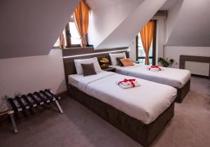 Ένα ή περισσότερα κρεβάτια σε δωμάτιο στο Guesthouse Villa Modex