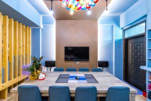 TV in/ali zabaviščno središče v nastanitvi 松楓親子民宿Songfeng Family B&B