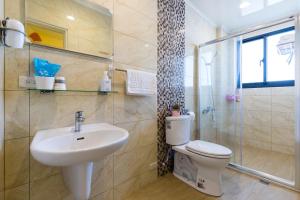 Koupelna v ubytování 松楓親子民宿Songfeng Family B&B + 37 fotografií