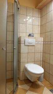 Kúpeľňa v ubytovaní Domki - Pod Smerkami