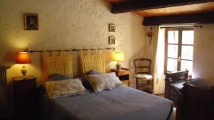 Postel nebo postele na pokoji v ubytování Maison d'Hôtes de Charme de Croccano