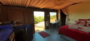 Foto dalla galleria di Shamba Yetu Mountain Lodge a Maanhaarrand