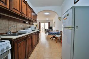 Kuchyň nebo kuchyňský kout v ubytování Island Break Residence