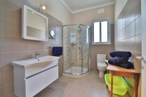Koupelna v ubytování Island Break Residence + 37 fotografií