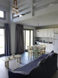 Kuchyňa alebo kuchynka v ubytovaní Thea Houses