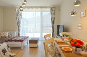 Posedenie v ubytovaní Sun&Sport Apartament PARZENICA w super lokalizacji niedaleko wyciagu + 6 fotografií