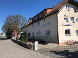 a building on the side of a street at Lindenhof Keulos in Künzell