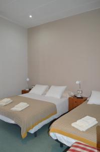 
A bed or beds in a room at Fonda Ca La Paula
