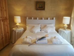Кровать или кровати в номере Betty Cake B&B