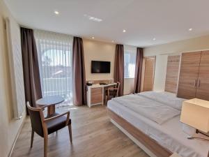 Postel nebo postele na pokoji v ubytování Wald-Hotel