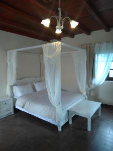 Voodi või voodid majutusasutuse Traditional Apartments Plagiaki toas