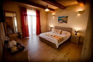 Postel nebo postele na pokoji v ubytování Soleil B&B Gozo + 37 fotografií