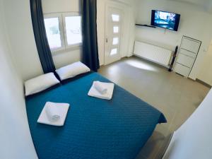 Posteľ alebo postele v izbe v ubytovaní Apartments Lopac Jadranovo