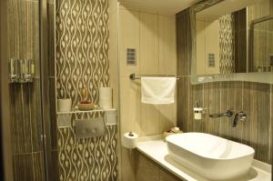 A bathroom at Agias Sofias Street Luxurious Studio