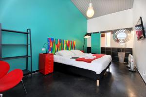 Postel nebo postele na pokoji v ubytování Hôtel Ascosa Aventure