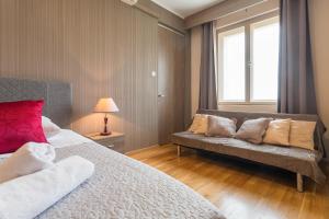 Ένα ή περισσότερα κρεβάτια σε δωμάτιο στο Golden Split Rooms
