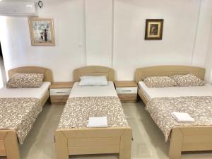 Postel nebo postele na pokoji v ubytování Apartmani Maja