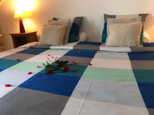 Ein Bett oder Betten in einem Zimmer der Unterkunft Chez Catharina Oldtimer B&B