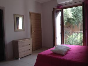 Krevet ili kreveti u jedinici u objektu Ampio appartamento Sulcis Iglesiente Sardegna