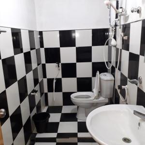 Vonios kambarys apgyvendinimo įstaigoje Dilshan Guest